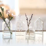 GLASS HOUSE BUD VASE