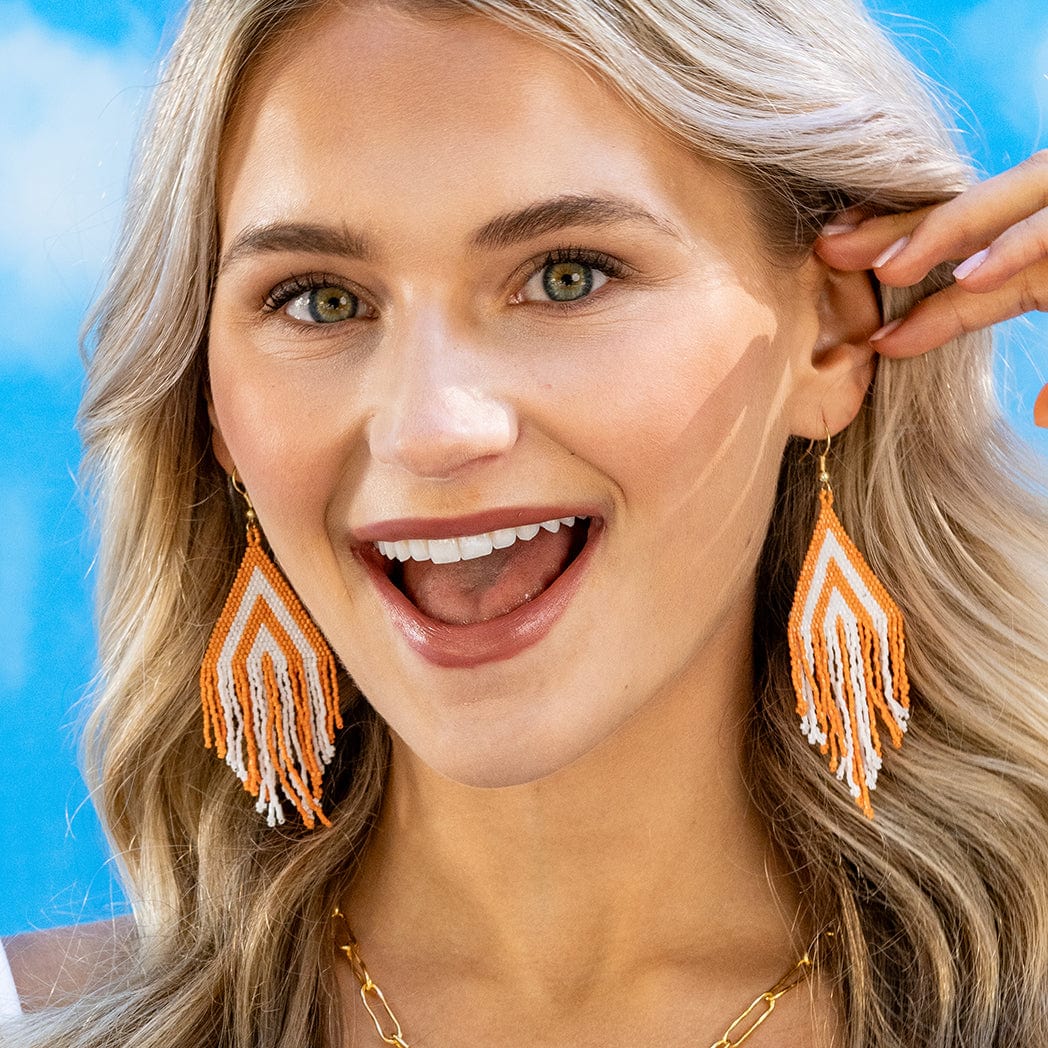 INK + ALLOY | Haley Game Day Stacked Triangle Beaded Fringe Earrings Orange and White